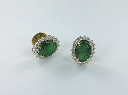 Pair of 750 two-tone gold earrings set with...