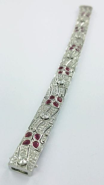 Bracelet articulé or gris 750 millièmes serti...