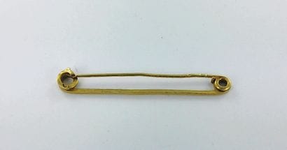 Gold safety pin brooch (accidents).
Weight:...