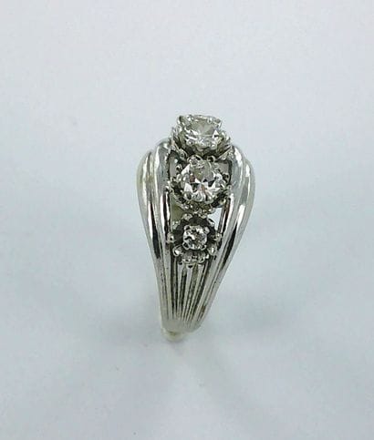 750-thousandths white gold ring set with...