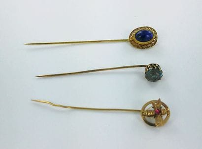 585-thousandths gold jabot pin set with one...
