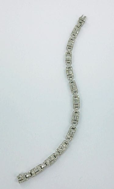 Bracelet or gris 750 millièmes à motifs articulés...