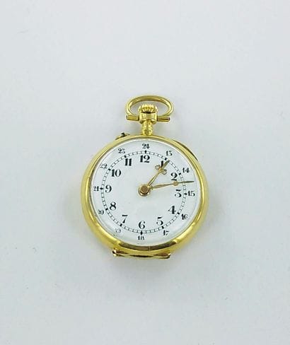 750-thousandths gold pocket watch with a...