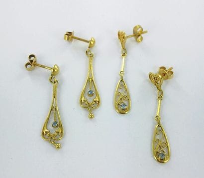 Two pairs of 750 gold earrings with small...