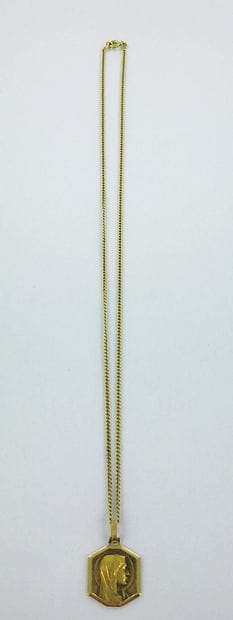 750-thousandths gold chain and pendant depicting...