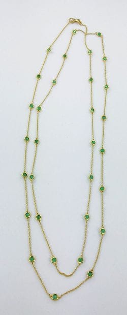 750-thousandths gold long necklace set alternately...
