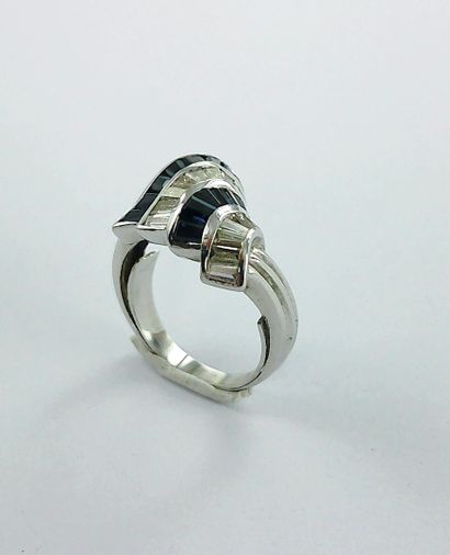 750-thousandths white gold ring set with...