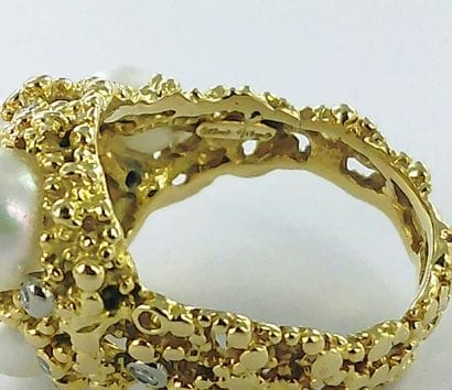 GILBERT ALBERT.
750-th gold ring set with...