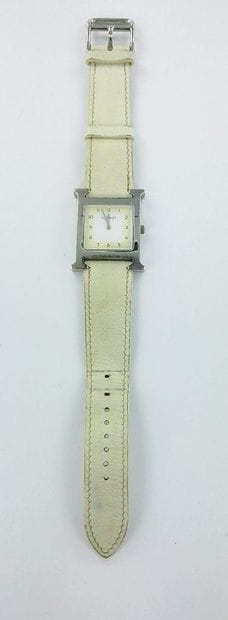 HERMES, H.
Steel watch with a leather strap,...