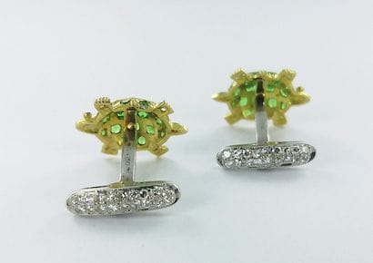 Pair of two-tone gold cufflinks in the shape...