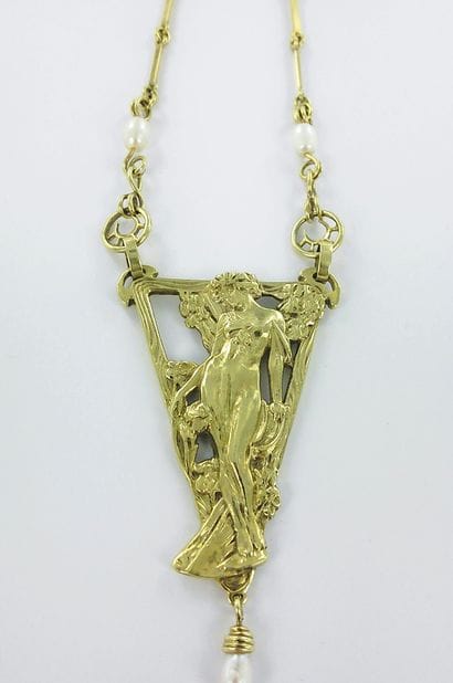 ALPHONSE MUCHA.
585-thousandths gold necklace...