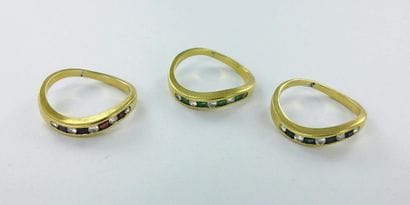 Three 750-th gold rings set with diamonds,...