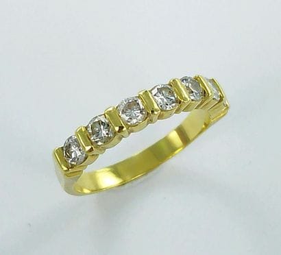 750-thousandth gold half-eternity band set...