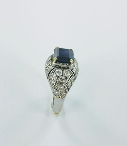 750-thousandths white gold ring set with...