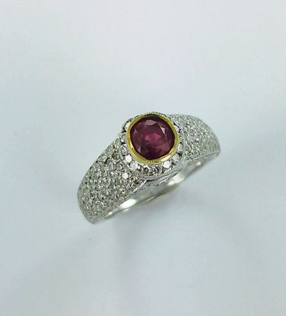A two-tone 750-thousandths gold ring set...