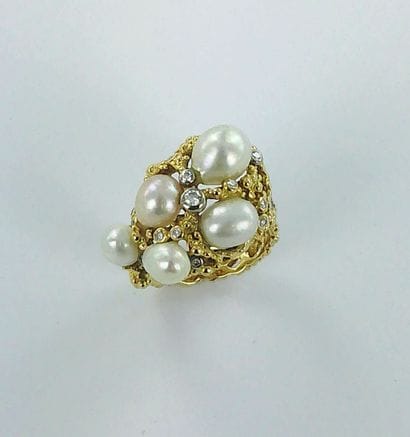 GILBERT ALBERT.
750-th gold ring set with...