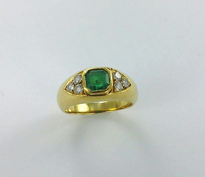 A 750 gold ring set in the center with a...