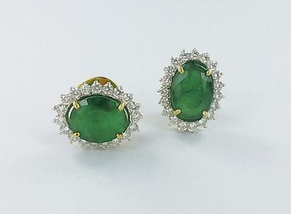 Pair of 750 two-tone gold earrings set with...