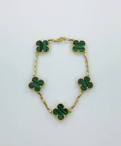 VAN CLEEF & ARPELS, Alhambra.
750-thousandths...