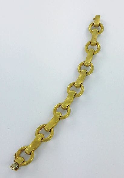 750-thousandth brushed gold link bracelet.
Weight:...