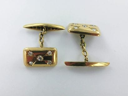 Pair of 750-thousandths gold cufflinks set...