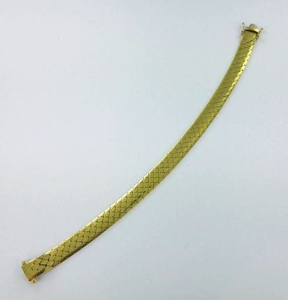 Flexible 750-thousandths gold bracelet with...