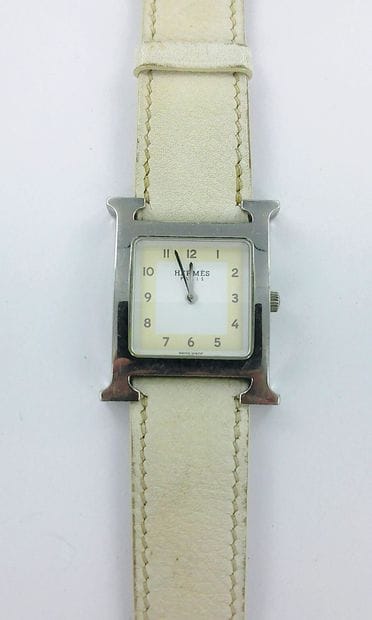 HERMES, H.
Steel watch with a leather strap,...