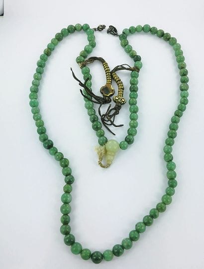 Metal necklace with jade and jadeite bea...