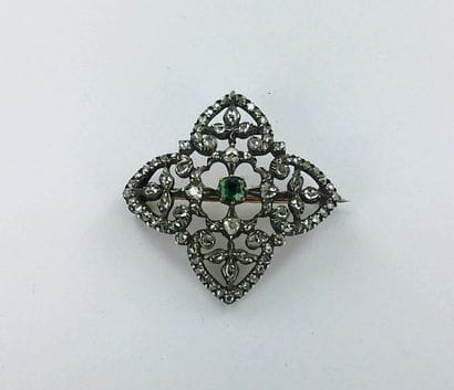 750-thousandths two-tone gold brooch set...