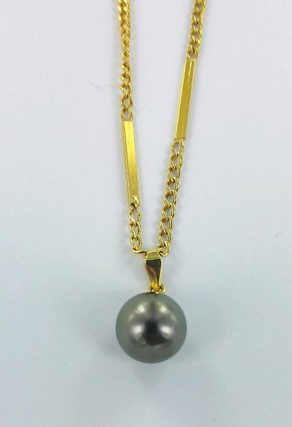 750-thousandths gold chain and pendant featuring...