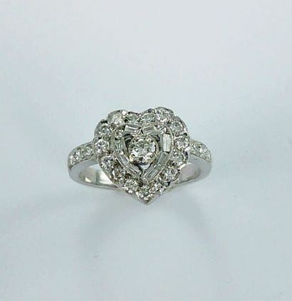 750-thousandths white gold heart-shaped ring...