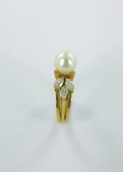 750-thousandths gold ring set with a pearl...