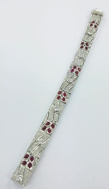 Bracelet articulé or gris 750 millièmes serti...