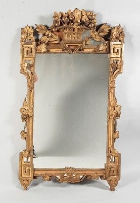 Beau miroir provençal dans un encadrement...