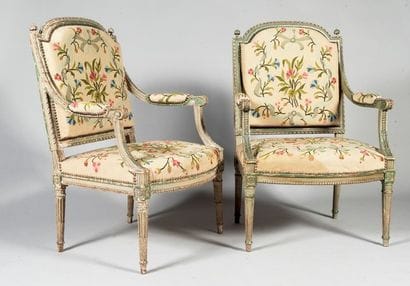 Paire de fauteuils à dossiers plat en hêtre...