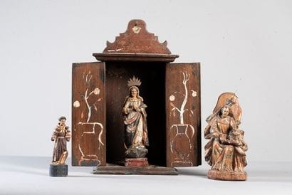 Dans un tabernacle ouvrant à 2 portes, 3...