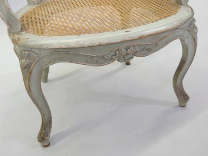 Fauteuil à assise et dossier canné en hêtre...