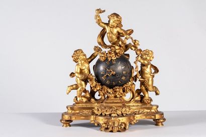 Importante pendule en bronze doré et patiné...