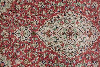 GHOM silk carpet with floral decoration on...