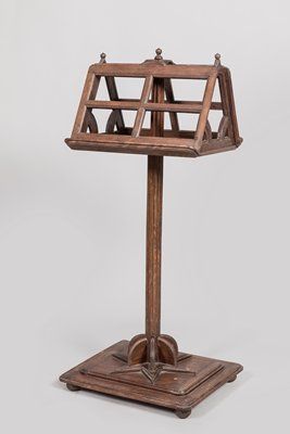 Lectern in walnut, double face resting on...