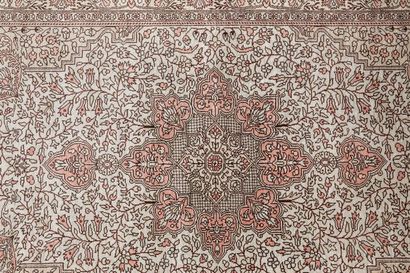 Persian style silk carpet with stylized floral...