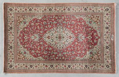 GHOM silk carpet with floral decoration on...