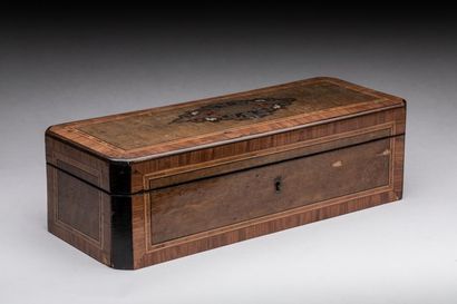 In a glove box in rosewood veneer and Boulle...