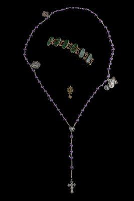 Silver and amethyst rosary. 
A small cross...