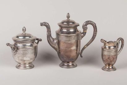 Three pieces of coffee service on pedestal...