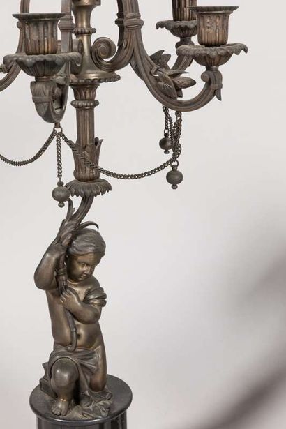 Mantelpiece including a marble and bronze...