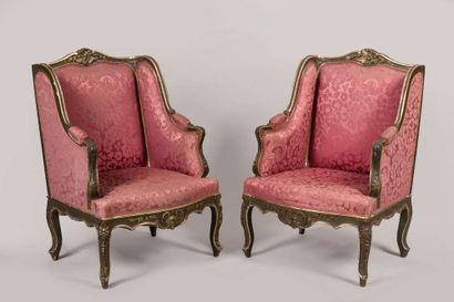 Suite of four carved, stuccoed, gilded and...