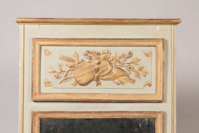 Gilded wood trumeau on a grey lacquered background...
