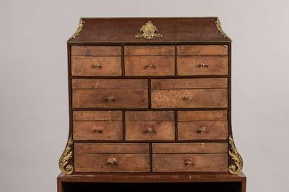 Cardboard end of desk in rosewood and rosewood...