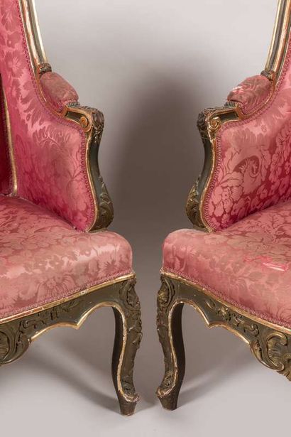 Suite of four carved, stuccoed, gilded and...